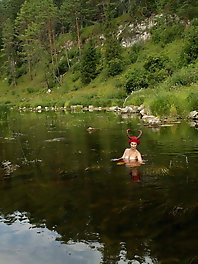 With Horns In Red Dress In Shallow River