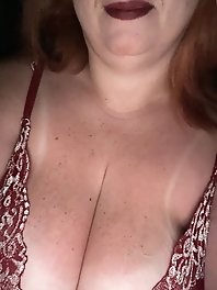 My partner displaying her breasts