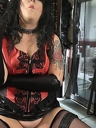 The mistress is smoking a cigar through a sex toy