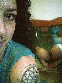 The dominant woman is opening her genitals