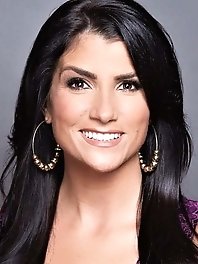 Young looking mature businesswoman is masturbating herself